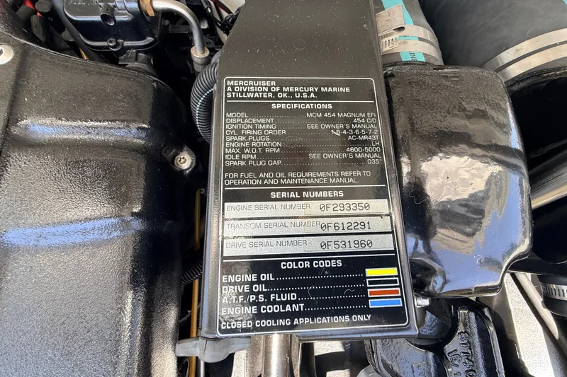 Slide: The Image of Close-up of a 1995 Formula 303 SR-1 engine specifications and serial numbers plate. - 43