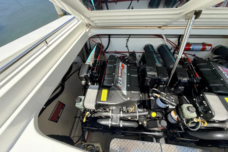 Slide: The Image of Engine compartment of a 1995 Formula 303 SR-1 boat with MerCruiser EFI engines. - 36