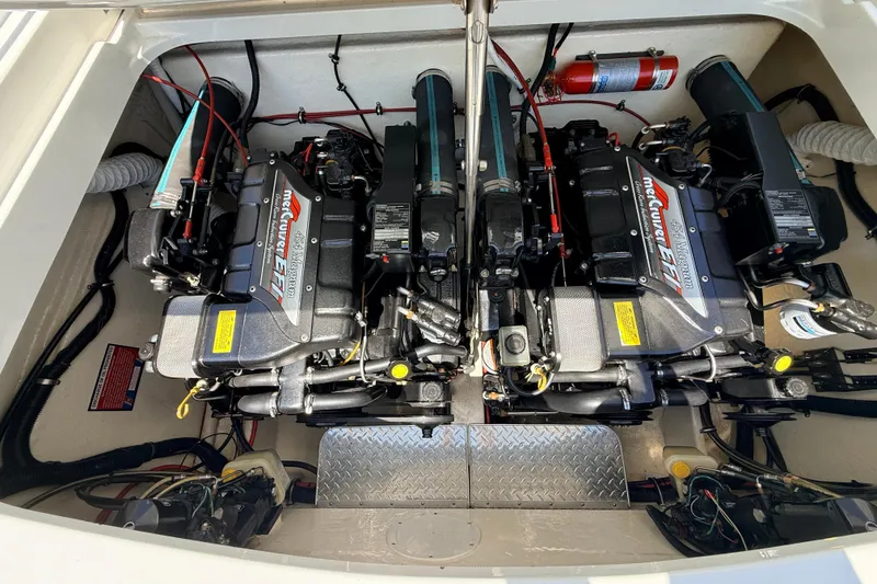 Slide: The Image of Twin MerCruiser engines in a 1995 Formula 303 SR-1 boat engine compartment. - 38