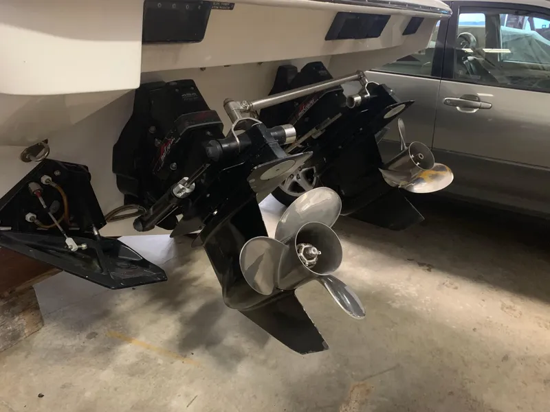 Slide: The Image of Two powerful propellers at the stern of a boat, parked in a garage. - 41