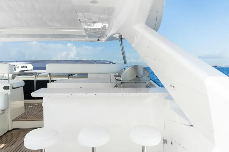 Slide: The Image of Luxurious 2011 Ferretti Yachts 97 with sleek outdoor seating and ocean view. - 48