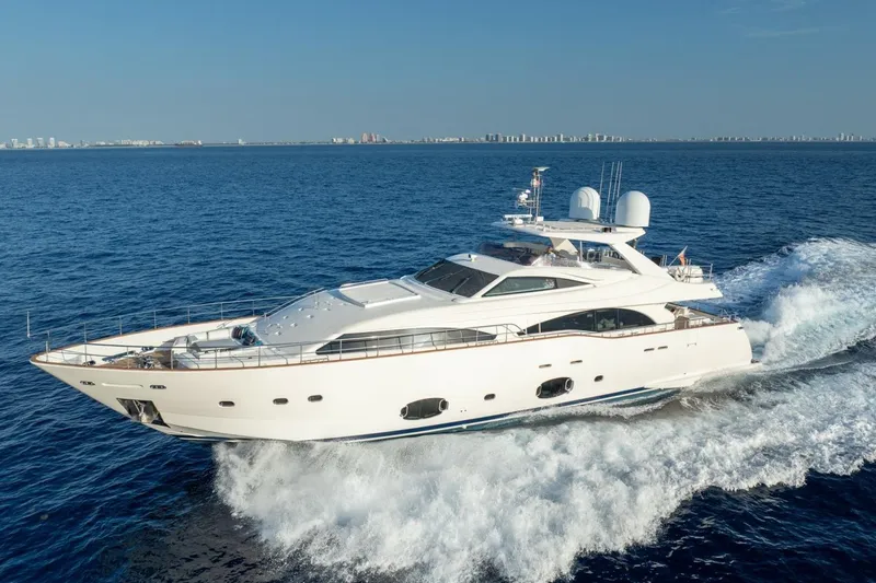 Slide: The Image of 2011 Ferretti Yachts 97 cruising on open sea, featuring sleek design and spacious deck. - 49