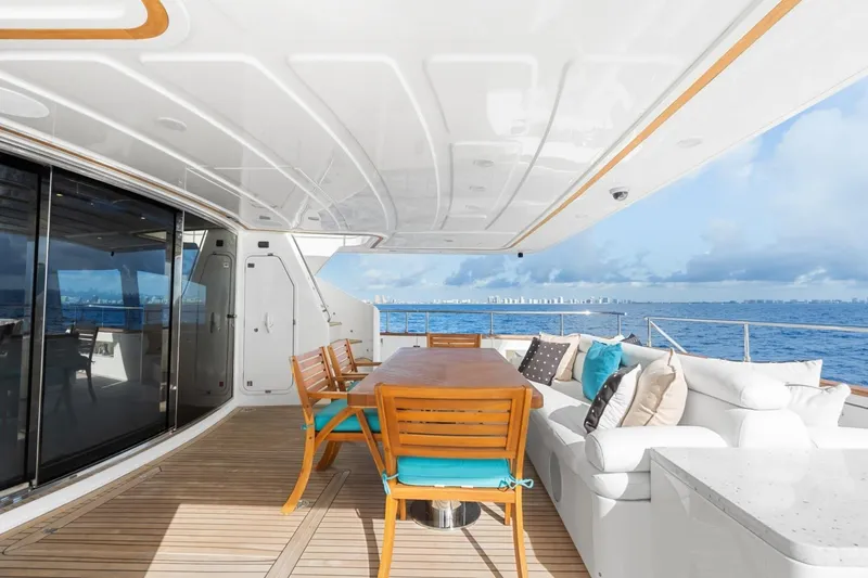 Slide: The Image of Luxurious 2011 Ferretti Yachts 97 deck with elegant seating and ocean view. - 59