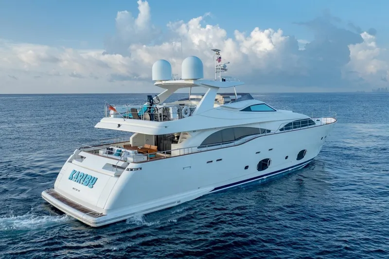 Slide: The Image of Luxurious 2011 Ferretti Yachts 97 cruising on open sea under clear skies. - 6