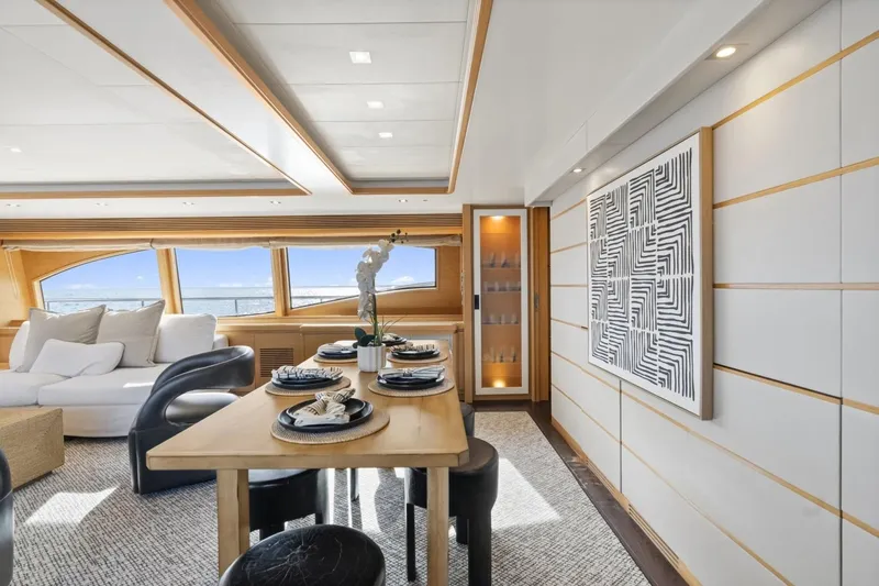 Slide: The Image of Luxurious interior of 2011 Ferretti Yachts 97, featuring elegant dining area and modern decor. - 15