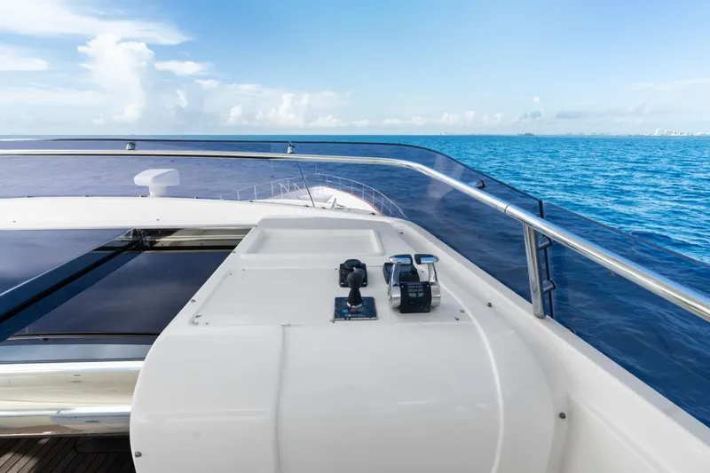 Slide: The Image of Luxurious 2011 Ferretti Yachts 97 cruising on open sea under clear blue sky. - 47