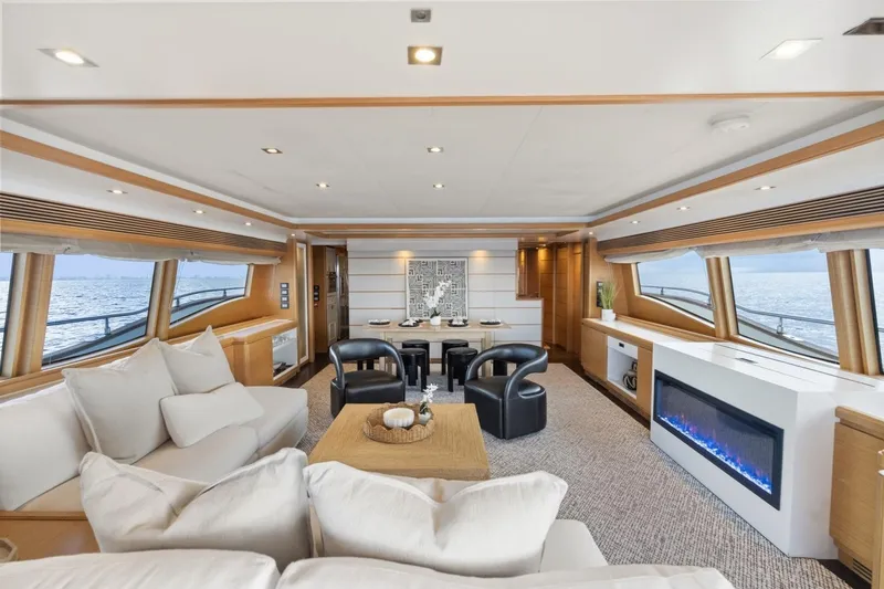 Slide: The Image of Luxurious interior of 2011 Ferretti Yachts 97, featuring elegant seating and panoramic ocean views. - 10