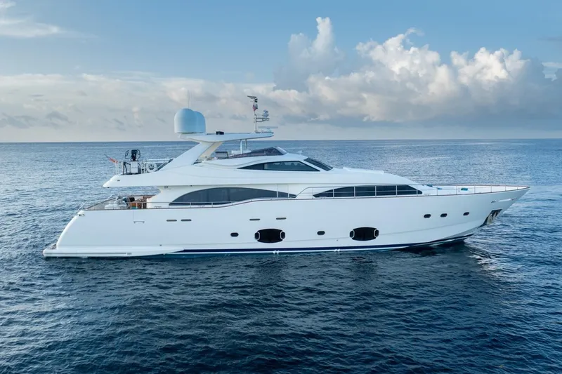 Slide: The Image of Luxurious 2011 Ferretti Yachts 97 cruising on open sea under cloudy sky. - 5