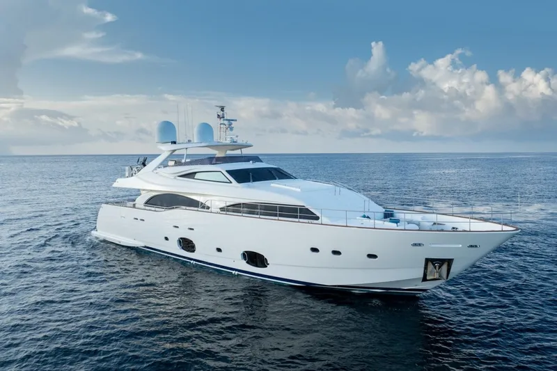 Slide: The Image of Luxurious 2011 Ferretti Yachts 97 cruising on open sea under clear skies. - 4