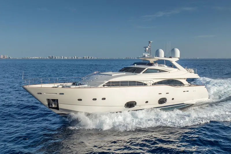 Slide: The Image of Luxurious 2011 Ferretti Yachts 97 cruising on open sea under clear blue sky. - 7
