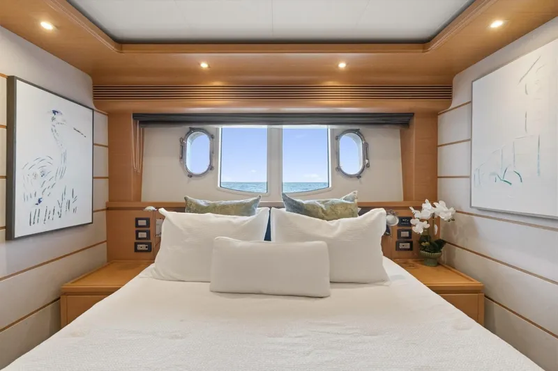 Slide: The Image of Luxurious bedroom interior of 2011 Ferretti Yachts 97 with ocean view through portholes. - 37