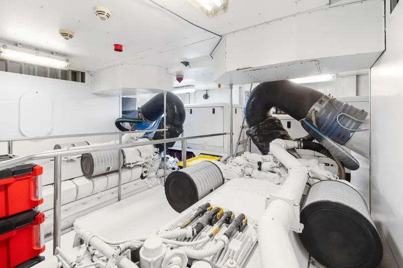 Slide: The Image of Engine room of 2011 Ferretti Yachts 97, showcasing machinery and ventilation systems. - 64