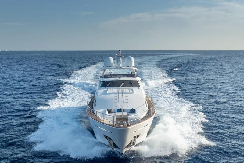 Slide: The Image of Luxurious 2011 Ferretti Yachts 97 cruising on open sea under clear skies. - 8
