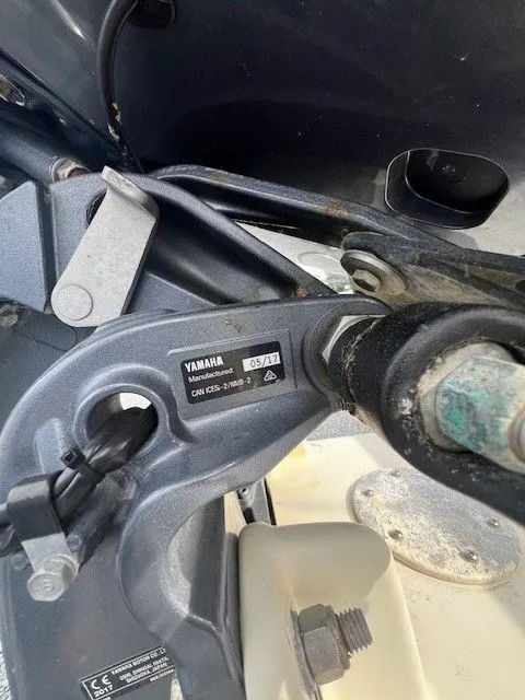 Slide: The Image of Close-up of a Yamaha boat engine with visible parts and labels. - 11