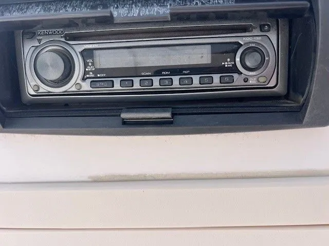 Slide: The Image of A Kenwood car stereo is installed in a boat. - 22