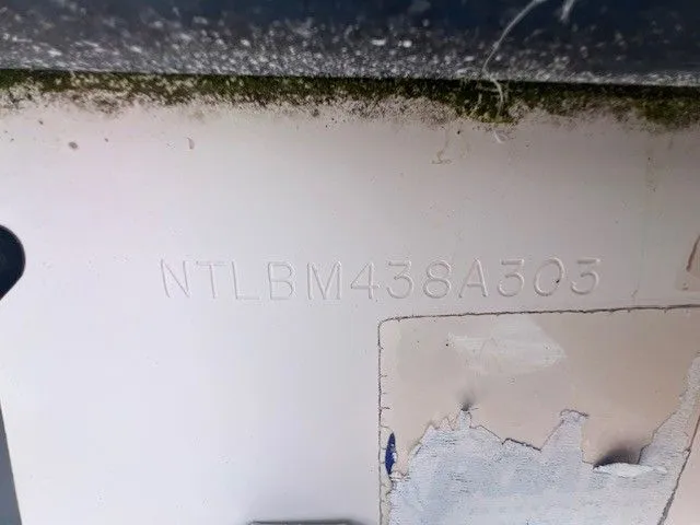 Slide: The Image of Close-up of a serial number on a boat hull. - 12