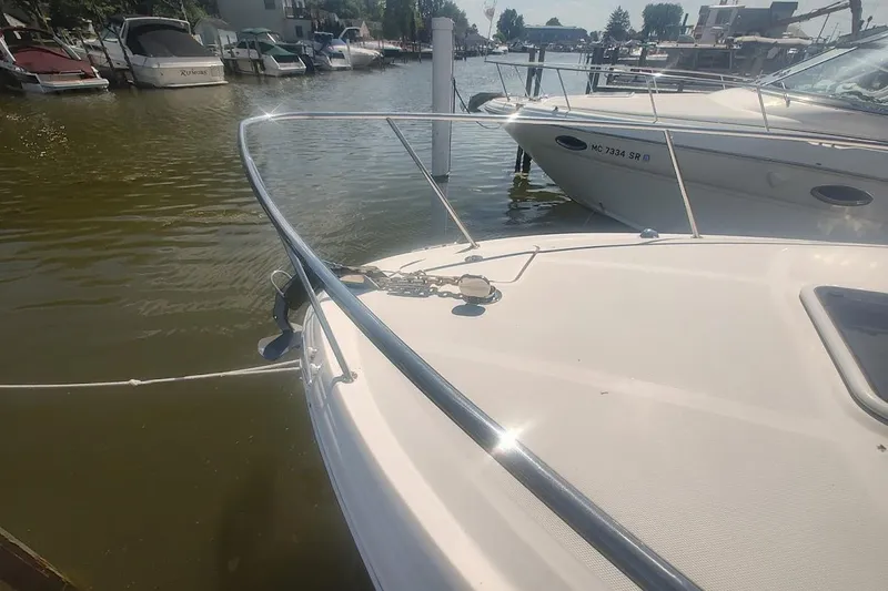 Slide: The Image of 2008 Sea Ray Sundancer 280 docked at marina, sunny day, calm waters. - 6