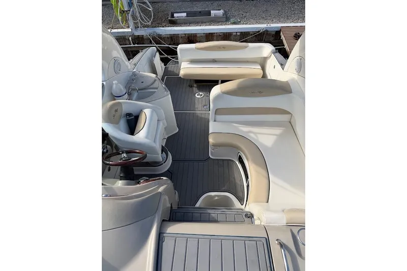 Slide: The Image of 2008 Sea Ray Sundancer 280 interior with plush seating and sleek design. - 16