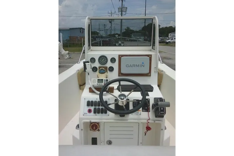 Slide: The Image of 2008 C-Dory 22' Angler boat dashboard with Garmin navigation system. - 17