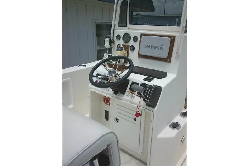 Slide: The Image of 2008 C-Dory 22' Angler boat console with Garmin navigation system. - 22