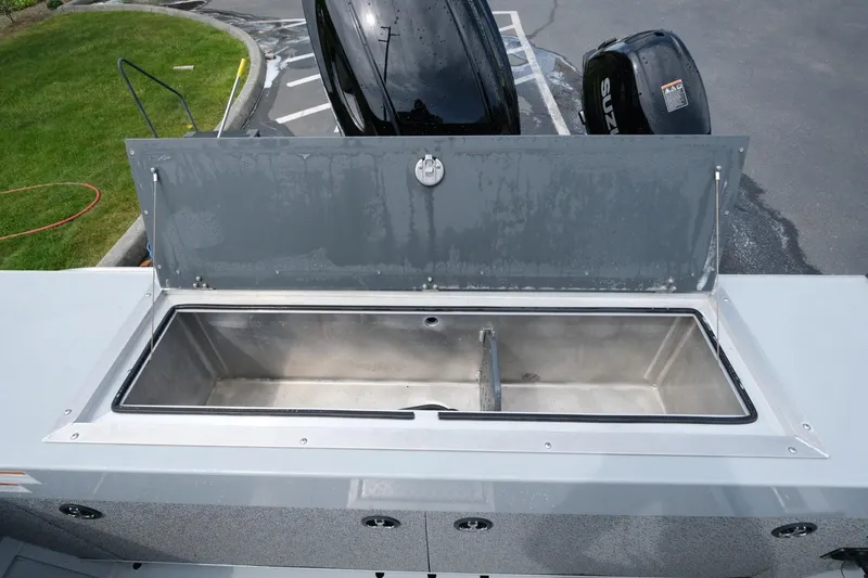 Slide: The Image of 2022 Hewescraft 210 Sea Runner ET Hardtop with open storage compartment. - 28
