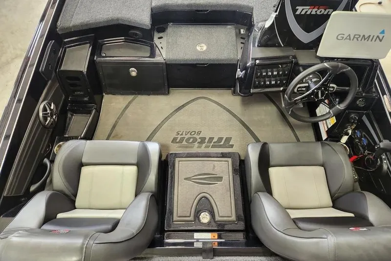 Slide: The Image of Interior of 2026 Triton 20XP boat with Garmin system and dual seating. - 3