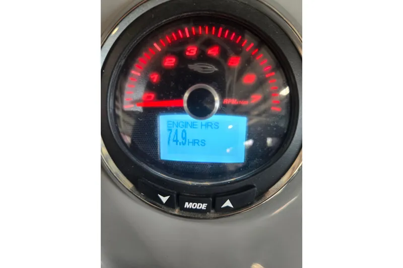 Slide: The Image of Dashboard of 2023 Chaparral 23 SSi showing 74.9 engine hours. - 14