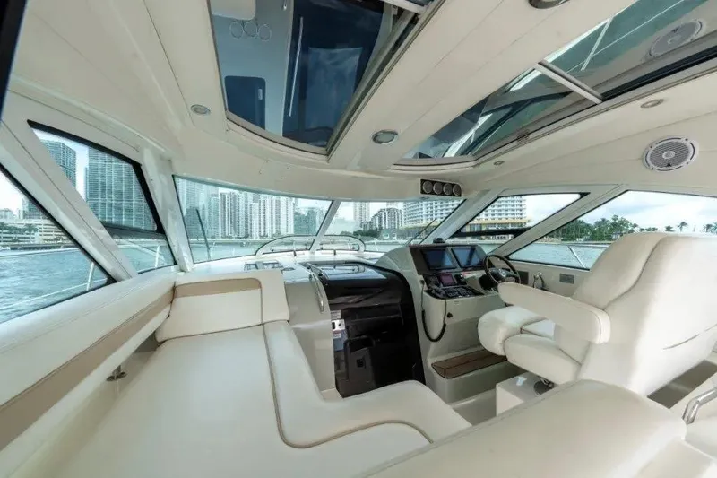 Slide: The Image of Luxurious interior of 2009 Sea Ray 43 Sundancer yacht with city skyline view. - 47