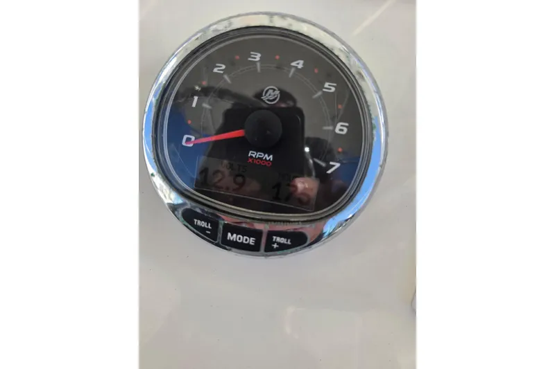 Slide: The Image of Tachometer of 2021 SeaVee 290B boat displaying RPM and voltage readings. - 3