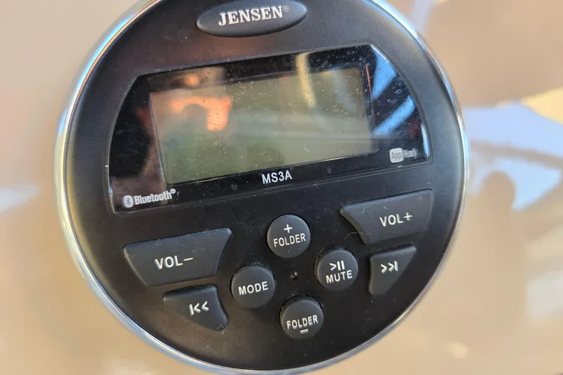 Slide: The Image of Jensen MS3A Bluetooth stereo system on 2016 Manitou 23 Oasis SR boat. - 29