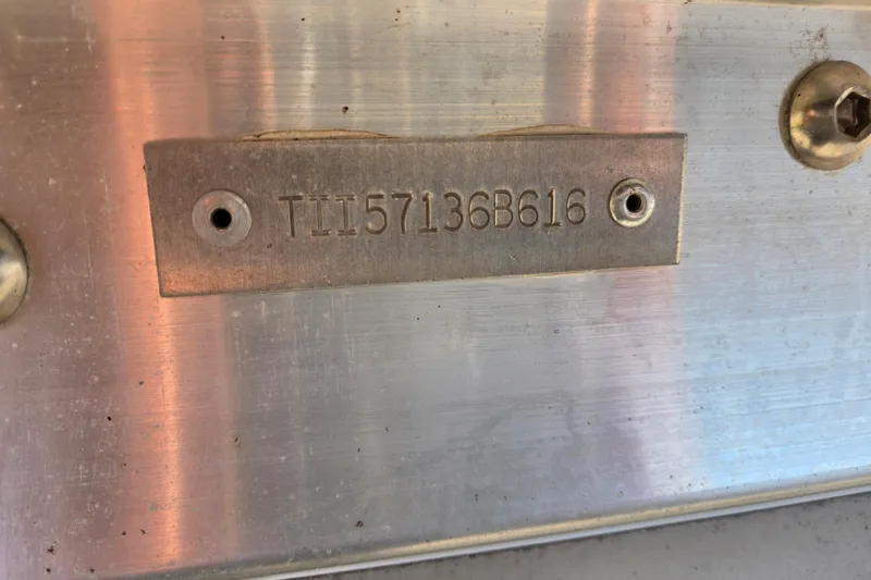 Slide: The Image of Hull identification number on 2016 Manitou 23 Oasis SR boat. - 45