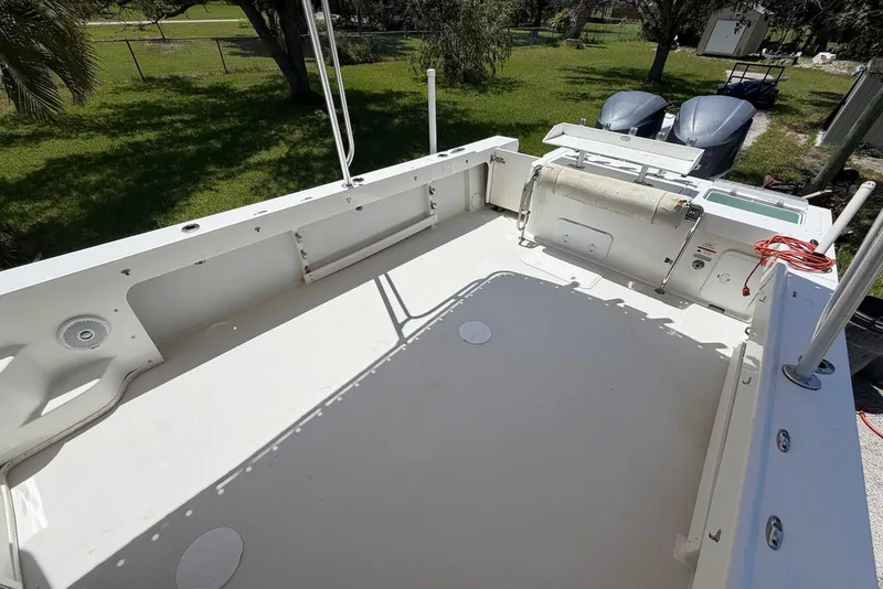 Slide: The Image of 2016 Parker 2820 XLD Sport Cabin boat deck with spacious layout and dual engines. - 13