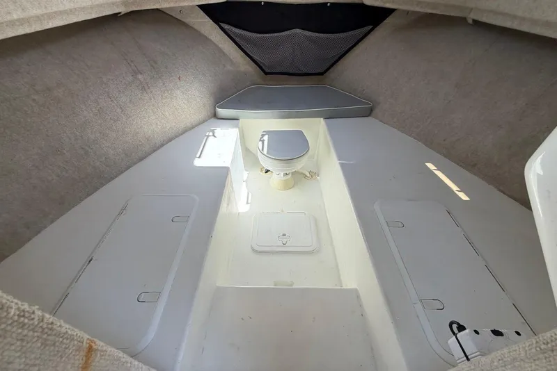 Slide: The Image of 2016 Parker 2820 XLD Sport Cabin interior with toilet and storage compartments. - 21