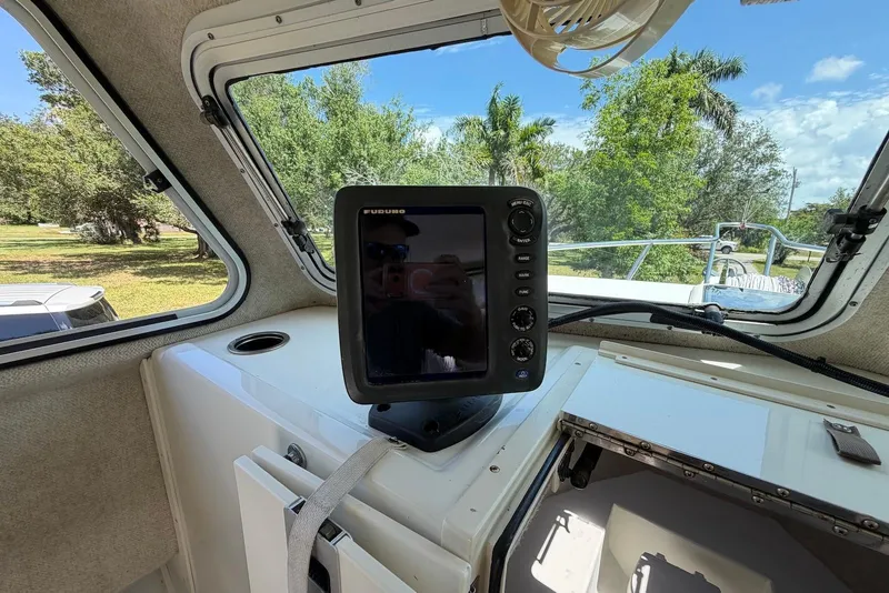Slide: The Image of Interior of 2016 Parker 2820 XLD Sport Cabin with navigation system and scenic view. - 20