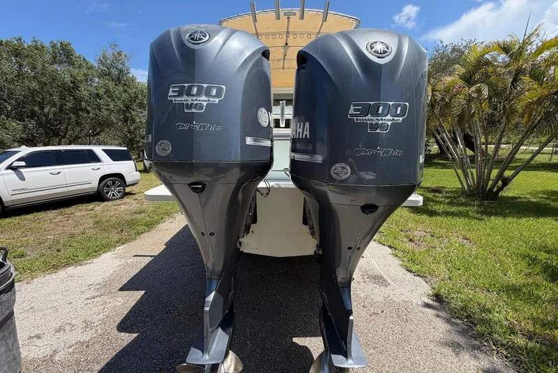 Slide: The Image of Twin Yamaha 300 V6 outboard engines on a 2016 Parker 2820 XLD Sport Cabin boat. - 7