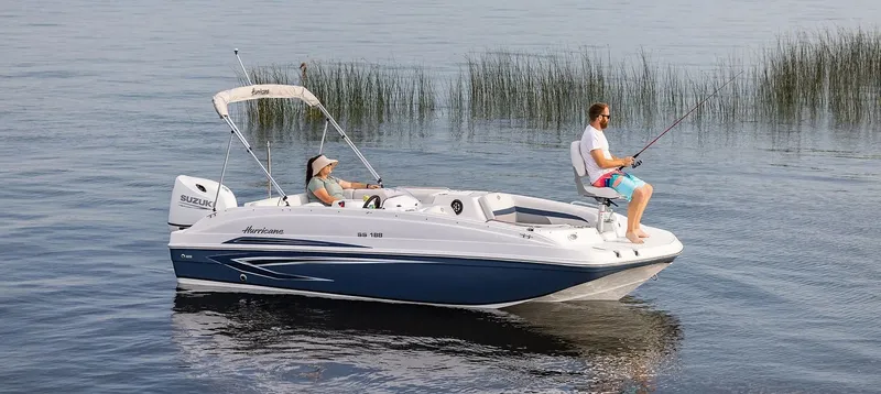 The Image of 2021 Hurricane 188 SunDeck Sport -OB on calm water with two people fishing. - 12