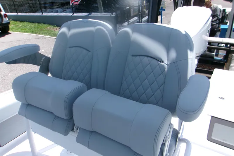 Slide: The Image of Luxurious seating on 2027 Sportsman Masters 247OE Bay Boat with quilted design and armrests. - 7
