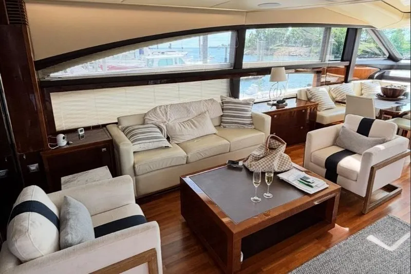 Slide: The Image of Luxurious interior of 2009 Princess 85 Motor Yacht with elegant seating and panoramic windows. - 4