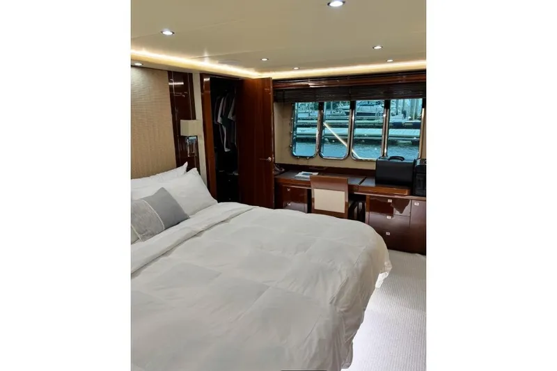 Slide: The Image of Luxurious bedroom interior of 2009 Princess 85 Motor Yacht with elegant furnishings and large windows. - 10