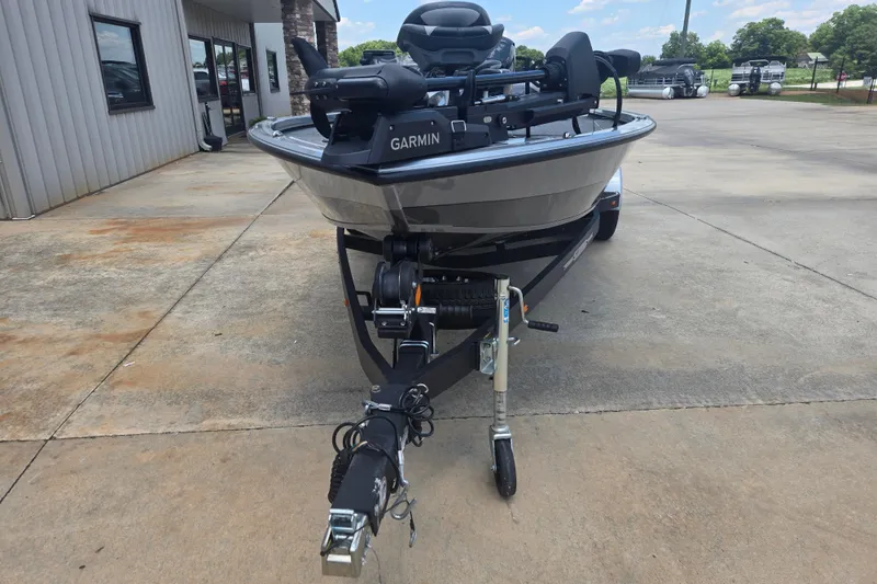 Slide: The Image of 2023 Vexus AVX1980C boat on trailer with Garmin equipment, parked outdoors. - 6