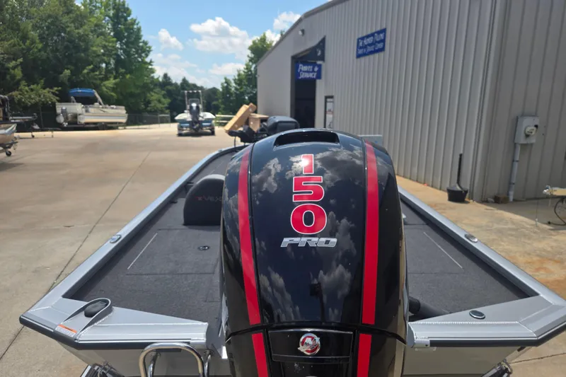 Slide: The Image of 2023 Vexus AVX1980C boat with 150 Pro engine at a service center. - 15