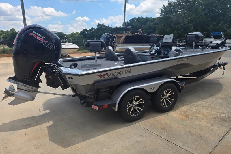 Slide: The Image of 2023 Vexus AVX1980C boat with Mercury Pro XS engine on a trailer. - 4