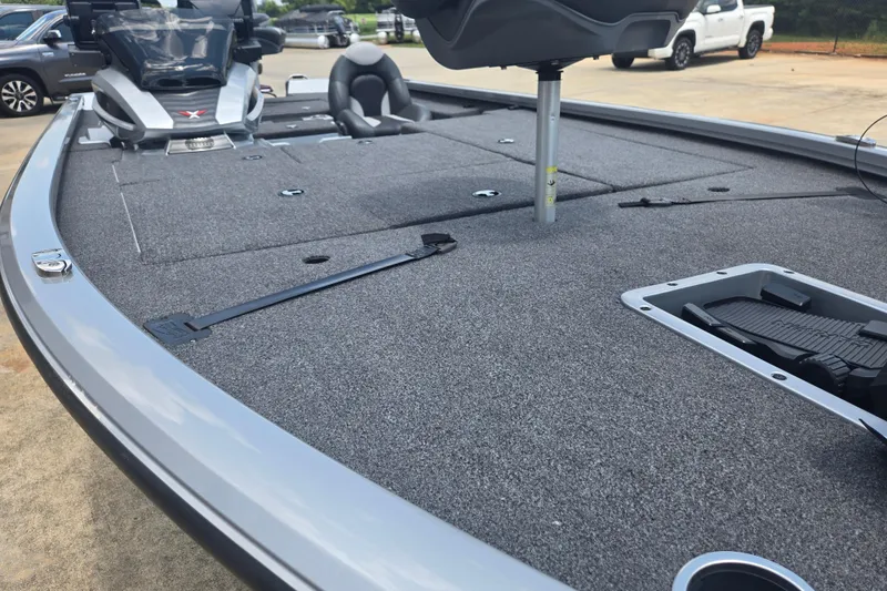 Slide: The Image of 2023 Vexus AVX1980C boat deck with seating and storage compartments. - 9
