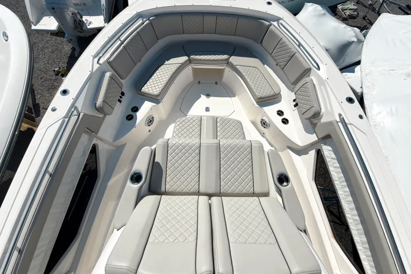 Slide: The Image of 2023 Pursuit S 378 Sport boat interior with luxurious seating and modern design. - 10
