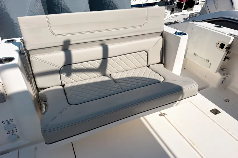 Slide: The Image of 2023 Pursuit S 378 Sport boat with luxurious cushioned seating. - 2