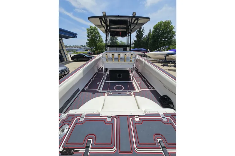 Slide: The Image of 2005 Fountain 34 Sportfish CC Open Bow boat with spacious deck and modern design. - 40