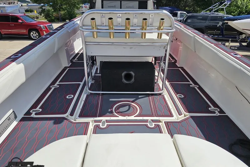 Slide: The Image of 2005 Fountain 34 Sportfish CC Open Bow with custom deck and rod holders. - 45