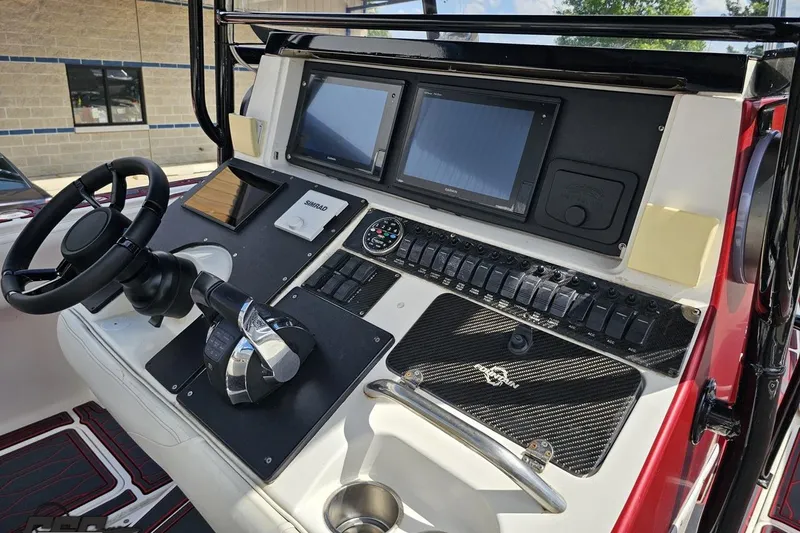 Slide: The Image of Control panel of a 2005 Fountain 34 Sportfish CC Open Bow boat. - 64