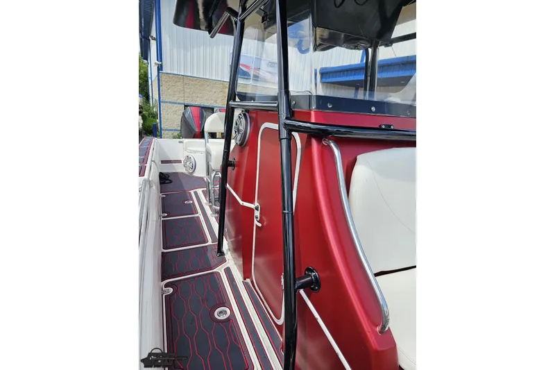 Slide: The Image of 2005 Fountain 34 Sportfish CC Open Bow with red and black interior detailing. - 85