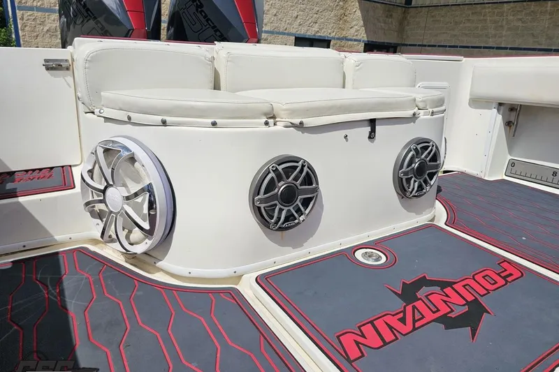Slide: The Image of 2005 Fountain 34 Sportfish CC Open Bow with speakers and cushioned seating. - 54